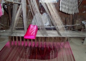 Brocade silk weaver at work