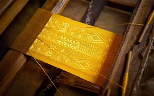 The golden orb cape on the loom